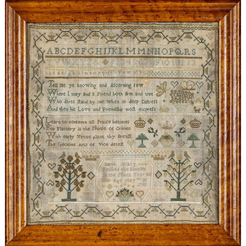 421 - A GEORGE III SAMPLER worked by Sarah Stacy in coloured wool on a coarse weave with upper and lower c... 