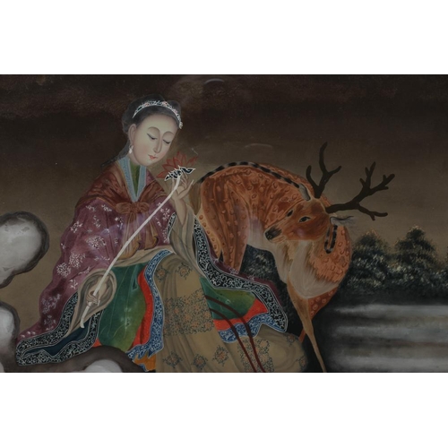 434 - A CHINESE REVERSE PAINTING ON GLASS of a young lady in landscape holding a flower with a deer beside... 