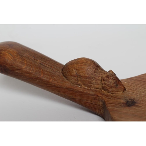 435 - A ROBERT THOMPSON ADZED OAK OVAL CHEESEBOARD with carved mouse trademark, 15