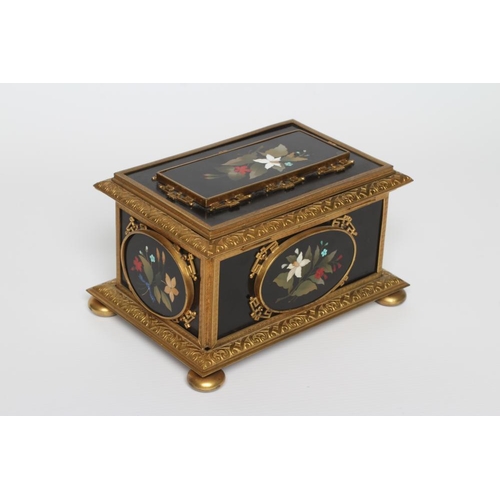 438 - AN ITALIAN STYLE ORMOLU MOUNTED BLACK SLATE PIETRA DURA INLAID CASKET, early 20th century, of rectan... 