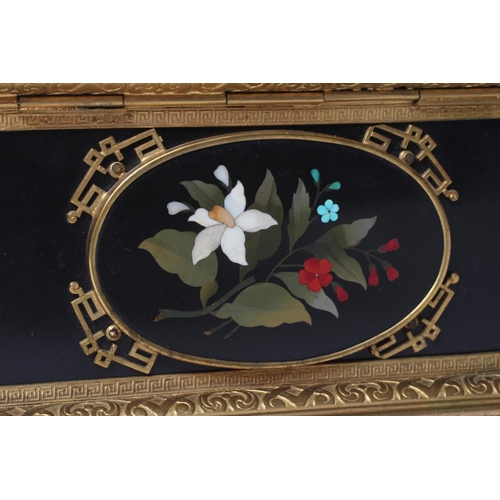 438 - AN ITALIAN STYLE ORMOLU MOUNTED BLACK SLATE PIETRA DURA INLAID CASKET, early 20th century, of rectan... 