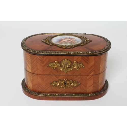 439 - A LOUIS XV STYLE KINGWOOD OVAL TRINKET BOX, early 20th century, with metal mounts and inset Sevres s... 