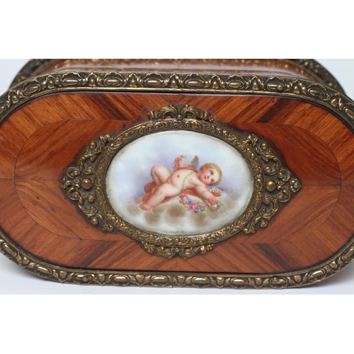 439 - A LOUIS XV STYLE KINGWOOD OVAL TRINKET BOX, early 20th century, with metal mounts and inset Sevres s... 