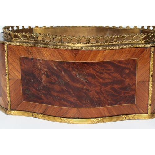 441 - A LOUIS XV STYLE KINGWOOD AND BURR WALNUT JARDINIERE, early 20th century, of serpentine form with gi... 