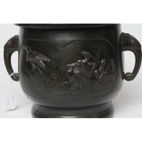 445 - A CHINESE BRONZE JARDINIERE cast in relief with exotic birds set within two panels, flanked by two h... 