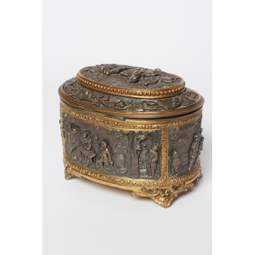 447 - A FRENCH GILDED ORMOLU OVAL JEWELLERY CASKET, late 19th century, with hinged top and medieval scenes... 