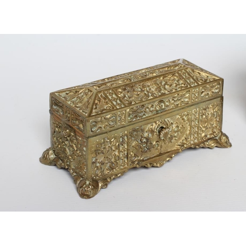 448 - A FRENCH GILDED ORMOLU OVAL MUSICAL JEWELLERY CASKET, early 20th century, with hinged top and mediev... 