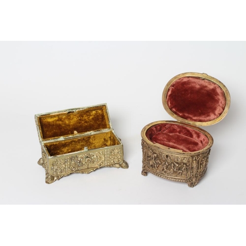 448 - A FRENCH GILDED ORMOLU OVAL MUSICAL JEWELLERY CASKET, early 20th century, with hinged top and mediev... 