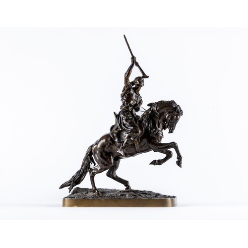 451 - EUGENE LANCERAY (Russian 1848-1886) A horseman with rifle held aloft on a naturalistic base, bronze,... 