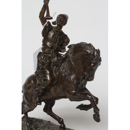 451 - EUGENE LANCERAY (Russian 1848-1886) A horseman with rifle held aloft on a naturalistic base, bronze,... 