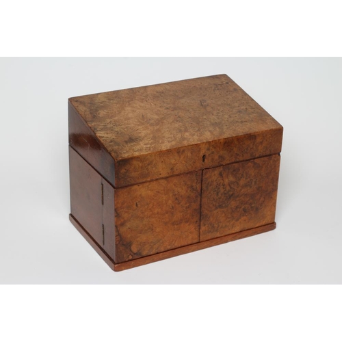 455 - A VICTORIAN WALNUT DESK TOP TIDY the hinged top opening to reveal a paper organiser with leather pen... 