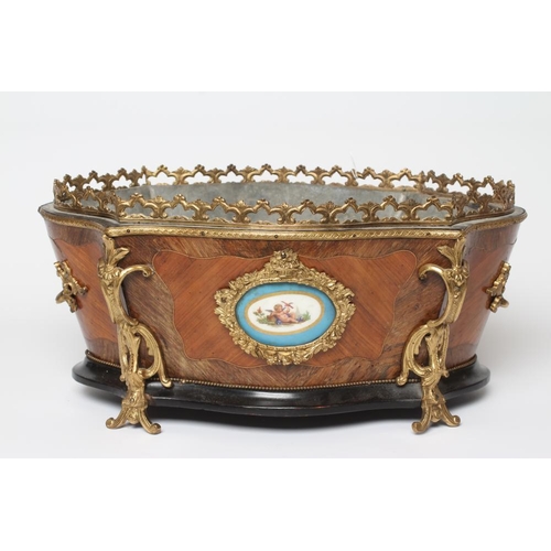 456 - A LOUIS XV STYLE KINGWOOD JARDINIERE, early 20th century, of serpentine form with foliate gilt metal... 