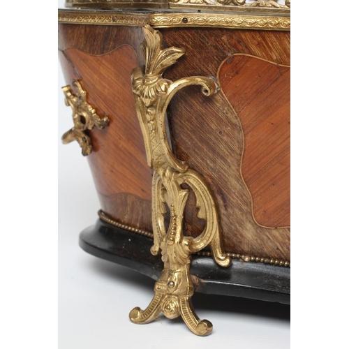 456 - A LOUIS XV STYLE KINGWOOD JARDINIERE, early 20th century, of serpentine form with foliate gilt metal... 