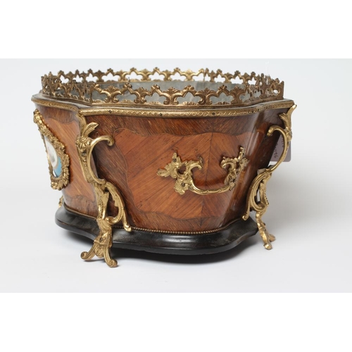 456 - A LOUIS XV STYLE KINGWOOD JARDINIERE, early 20th century, of serpentine form with foliate gilt metal... 