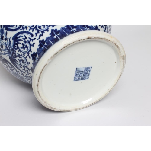 5 - A CHINESE BLUE AND WHITE PORCELAIN LARGE JAR AND COVER of baluster form, painted with panels of flow... 