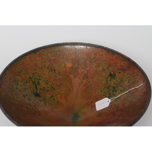 55 - ANDREW HILL (b.1964) - a large raku stoneware conical bowl with mottled bronze, copper and green gla... 