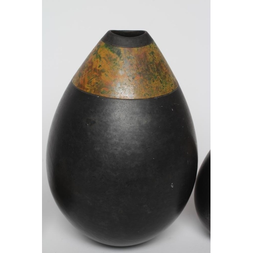 57 - ANDREW HILL (b.1964) - three raku stoneware ovoid vases with mottled glazes, incised initials to bas... 