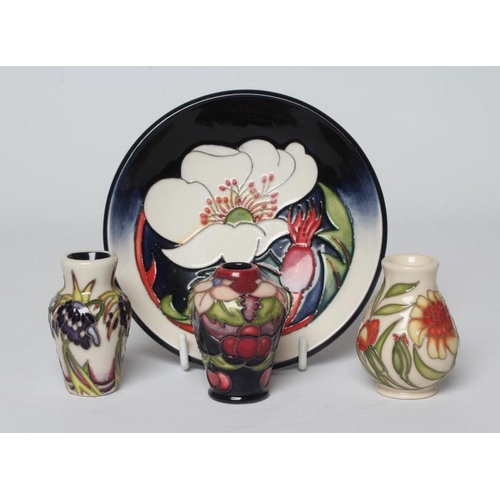 66 - THREE MOORCROFT POTTERY MINIATURE VASES comprising Persephone by Nicola Slaney, Marigold (October), ... 