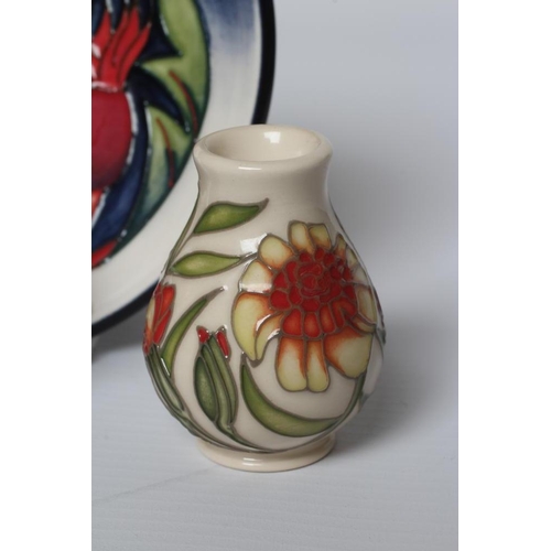 66 - THREE MOORCROFT POTTERY MINIATURE VASES comprising Persephone by Nicola Slaney, Marigold (October), ... 