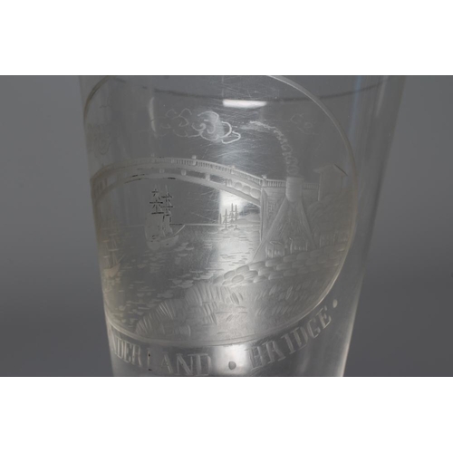 75 - A SUNDERLAND BRIDGE CLEAR GLASS GOBLET, the bucket bowl wheel engraved with a titled oval panel, iss... 