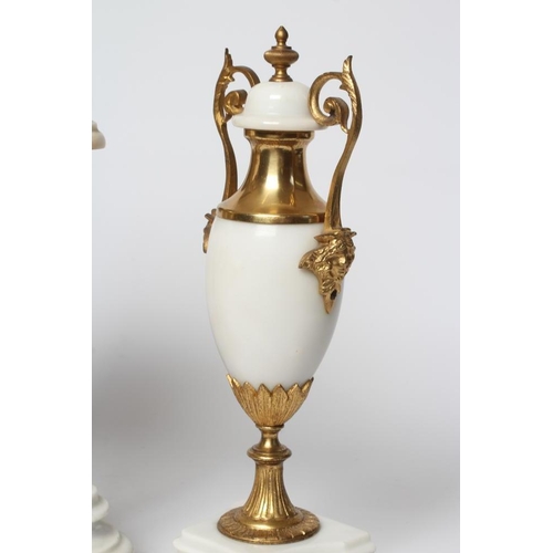 629 - A FRENCH WHITE ONYX AND GILT METAL CLOCK GARNITURE, c.1900, the twin barrel movement with outside co... 