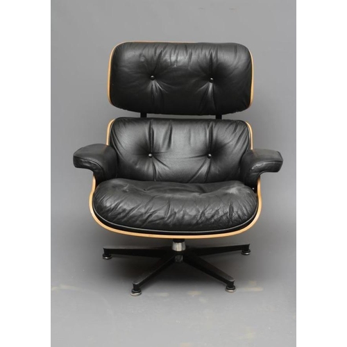 643 - AFTER CHARLES AND RAY EAMES - A LOUNGE CHAIR '670' AND OTTOMAN '671', modern, in rosewood veneered p... 