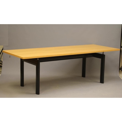 646 - CASSINA IMAESTRI LC6 (LE CORBUSIER) - A DINING TABLE, the oblong ash veneered top on four oval secti... 