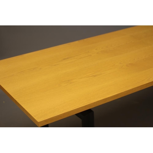 646 - CASSINA IMAESTRI LC6 (LE CORBUSIER) - A DINING TABLE, the oblong ash veneered top on four oval secti... 