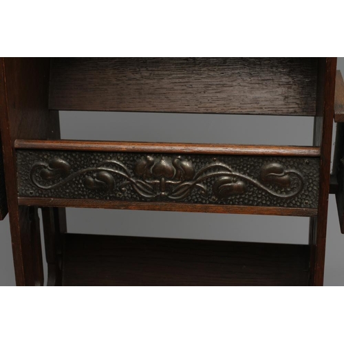 660 - AN ARTS AND CRAFTS OAK BOOKSTAND, c.1900, of oblong three tier form, the pierced and shaped sides wi... 