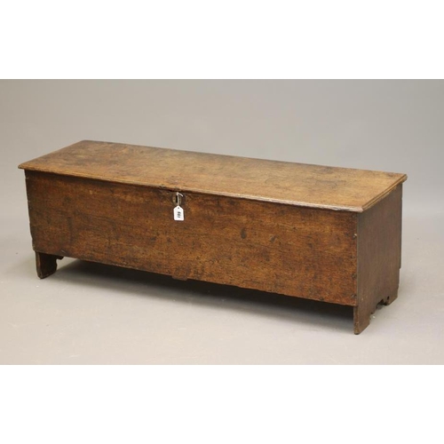 661 - AN OAK BOARDED SIX PLANK CHEST, early 18th century, the hinged lid with moulded edge opening to inte... 