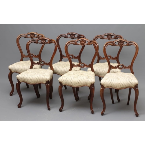 662 - A SET OF SIX VICTORIAN ROSEWOOD DINING CHAIRS button upholstered in a cream and green weave, the wai... 