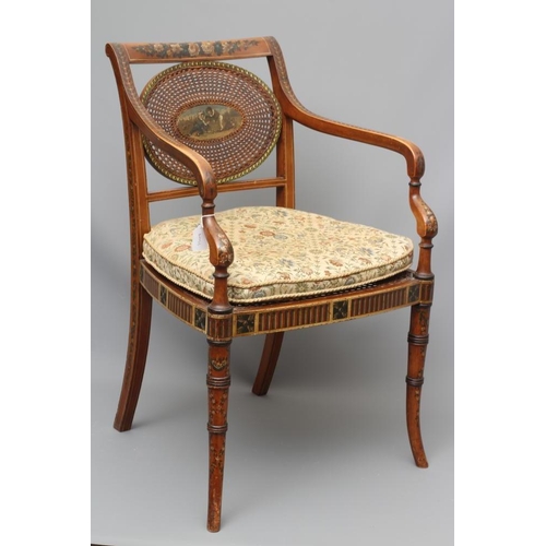 663 - AN EDWARDIAN CANED AND FLORAL PAINTED ELBOW CHAIR, early 20th century, the straight top rail over ov... 