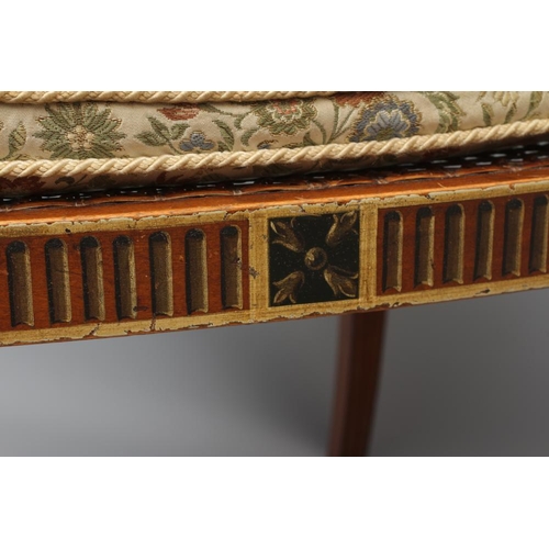 663 - AN EDWARDIAN CANED AND FLORAL PAINTED ELBOW CHAIR, early 20th century, the straight top rail over ov... 