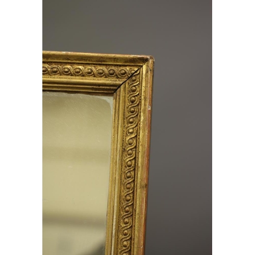 664 - AN EDWARDIAN TRIPLE PLATE GILDED WALL MIRROR, the oblong plates within a chain link moulded gilt ges... 