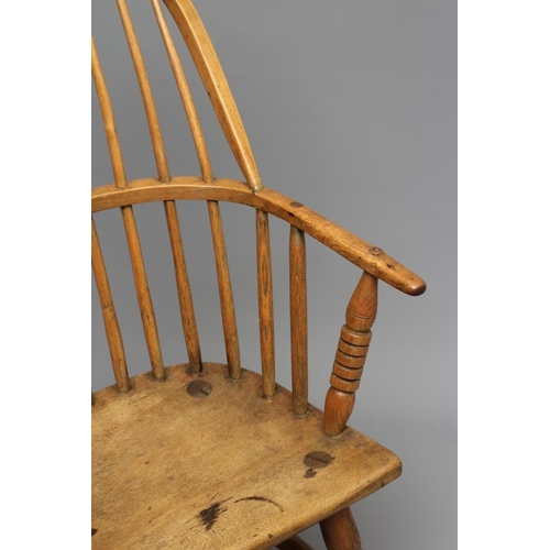 675 - AN ASH STICK BACK WINDSOR ARMCHAIR, early/mid 19th century, with hoop back, ring turned baluster arm... 