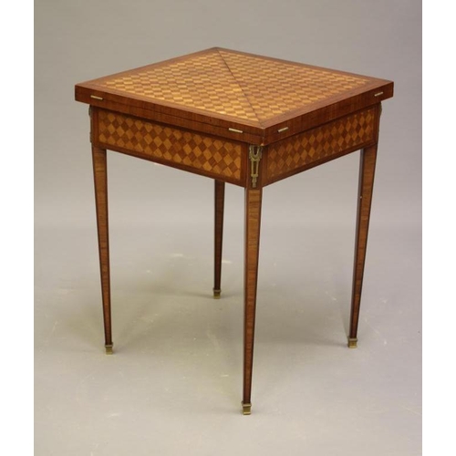 678 - A LOUIS XVI STYLE MAHOGANY AND PARQUETRY ENVELOPE CARD TABLE, c.1900, of canted square form with gil... 