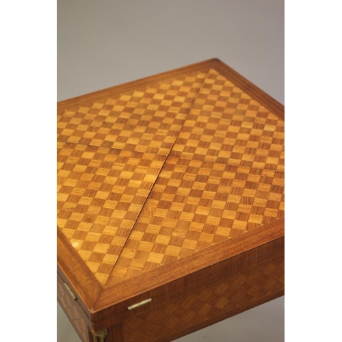 678 - A LOUIS XVI STYLE MAHOGANY AND PARQUETRY ENVELOPE CARD TABLE, c.1900, of canted square form with gil... 