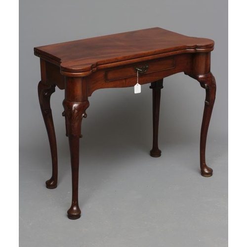 679 - A GEORGE II DESIGN MAHOGANY FOLDING TEA TABLE, late 19th century, the eared oblong top over waved fr... 