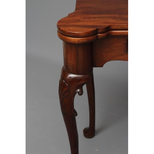 679 - A GEORGE II DESIGN MAHOGANY FOLDING TEA TABLE, late 19th century, the eared oblong top over waved fr... 