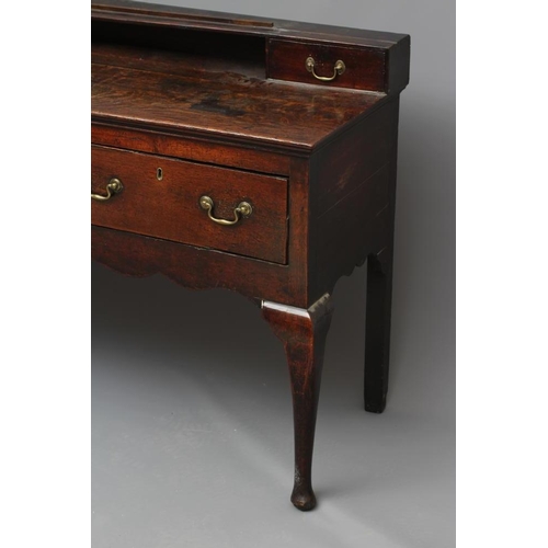 689 - A GEORGIAN OAK DRESSER, late 18th century, the moulded edged top with raised back with two small dra... 