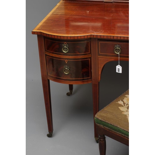 699 - AN EDWARDIAN MAHOGANY DRESSING TABLE, early 19th century, of inverted breakfront form crossbanded wi... 