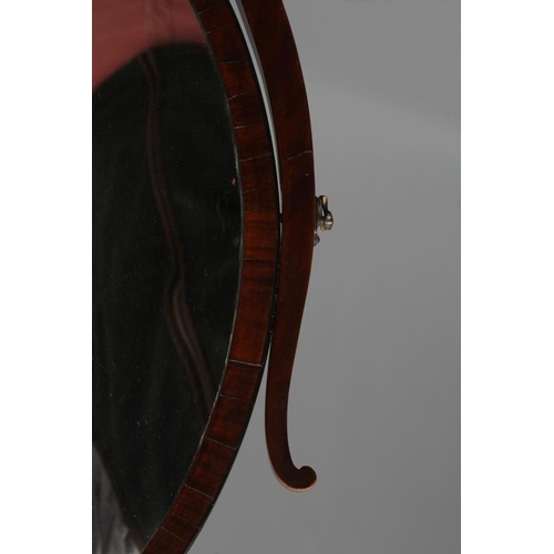 701 - A GEORGIAN MAHOGANY TOILET MIRROR, third quarter 18th century, of serpentine oblong form crossbanded... 