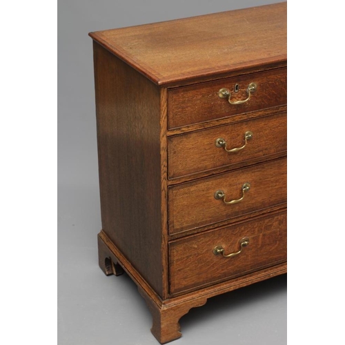 704 - AN OAK AND MAHOGANY BANDED STRAIGHT FRONT CHEST, 19th century, the moulded edged top over two short ... 