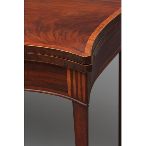 706 - A GEORGIAN MAHOGANY FOLDING CARD TABLE, late 18th century, of serpentine oblong form crossbanded wit... 