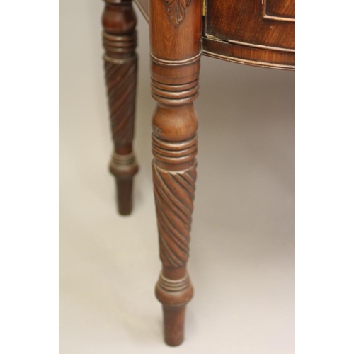 707 - A REGENCY MAHOGANY BOWED SIDEBOARD, early 19th century, the eared top with central shallow drawer ov... 