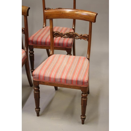 709 - A SET OF SIX EARLY VICTORIAN ROSEWOOD DINING CHAIRS, mid 19th century, the open back with curved top... 