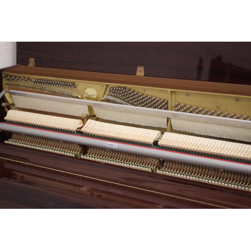 710 - AN UPRIGHT MAHOGANY CASED PIANO BY CHAPPELL, modern, the overstrung movement with sostenuto pedal, t... 