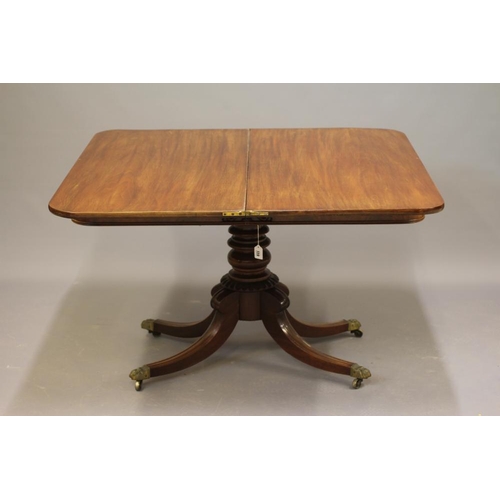 720 - A REGENCY MAHOGANY FOLDING BREAKFAST TABLE, early 19th century, the rounded oblong swivel top over p... 