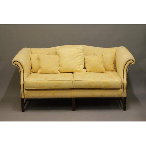 724 - A GEORGIAN STYLE HUMP BACKED SOFA, 20th century, upholstered in yellow floral silk damask, scrolled ... 