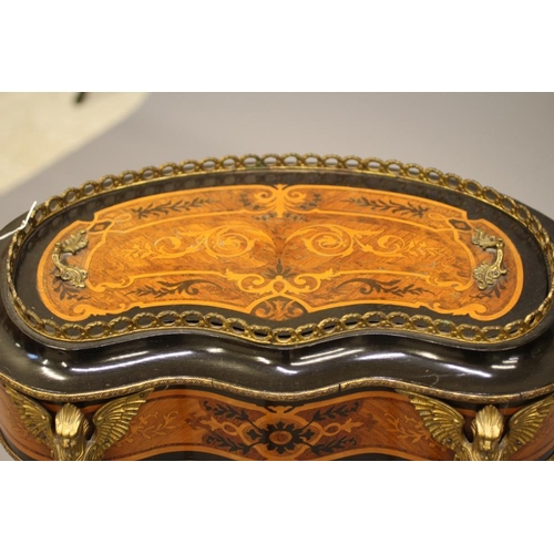 728 - A LOUIS XV STYLE KINGWOOD JARDINIERE, 20th century, of kidney form with foliate marquetry panels, eb... 